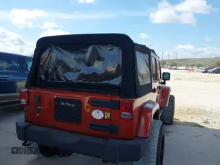 2014 Jeep Wrangler Unlimited Sahara z VIN 1C4BJWEG1EL209431, wystawiony jako IAAI lot #42325022 z przebiegiem 64 529 mil mil oraz . Historia ofert i sprzedaży dostępna na DreamBid. Obrazek 4.