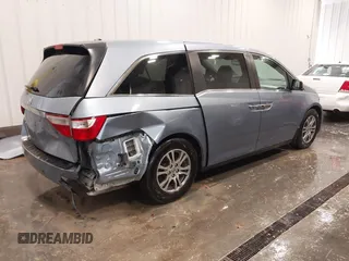 2013 Honda Odyssey EX-L with VIN 5FNRL5H67DB015512, listed as a IAAI auction lot 41758695 with 193,356 mi miles and . Bid and sale history available at carsss.com. Image 4.