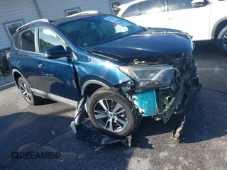 2017 Toyota RAV4 XLE with VIN 2T3WFREV4HW374796, listed as a IAAI auction lot 41204601 with 103,666 mi miles. Bid and sale history available at carsss.com. Image 1.