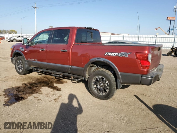 2016 Nissan Titan XD PRO-4X with VIN 1N6BA1F43GN512559, listed as a Copart auction lot 76691104 with 0 mi miles and Salvage Title. Bid and sale history available at carsss.com. Image 2.