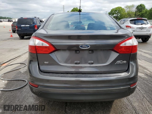 2015 Ford Fiesta SE z VIN 3FADP4BJ2FM114569, wystawiony jako Copart lot #56785265 z przebiegiem 71 045 mil mil oraz Szkoda całkowita • Salvage title. Historia ofert i sprzedaży dostępna na DreamBid. Obrazek 6.