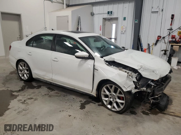 2014 Volkswagen Jetta GLI Edition 30 z VIN 3VW4S7AJ9EM277971, wystawiony jako Copart lot #88305645 z przebiegiem 167 931 mil mil oraz Szkoda całkowita • Salvage title. Historia ofert i sprzedaży dostępna na DreamBid. Obrazek 4.
