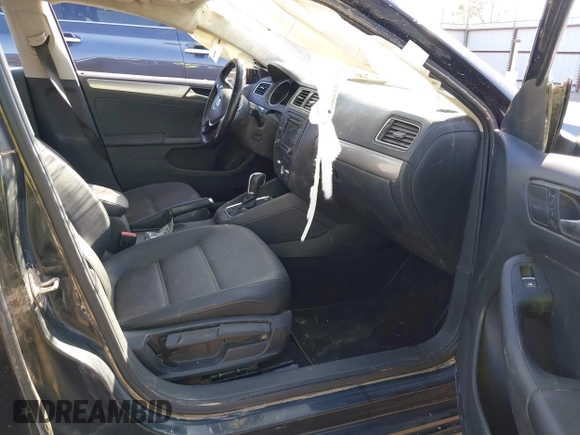 2015 Volkswagen Jetta SE z VIN 3VWD07AJ3FM266598, wystawiony jako IAAI lot #41757080 z przebiegiem 127 815 mil mil oraz . Historia ofert i sprzedaży dostępna na DreamBid. Obrazek 5.