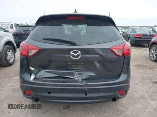 2016 Mazda CX-5 Sport with VIN JM3KE2BY4G0858100, listed as a IAAI auction lot 41368135 with 93,435 mi miles. Bid and sale history available at carsss.com. Image 16.