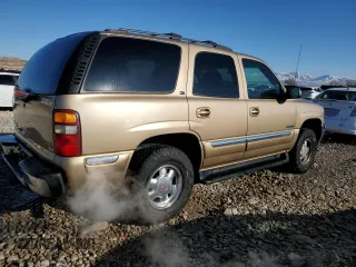 2000 GMC Yukon SLT with VIN 1GKEK13T9YJ103178, listed as a Copart auction lot 87909165 with 248,795 mi miles and Salvage Title. Bid and sale history available at carsss.com. Image 3.