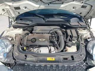 2013 MINI Convertible S with VIN WMWZP3C51DT297843, listed as a IAAI auction lot 41527353 with 127,827 mi miles and . Bid and sale history available at DreamBid. Image 10.