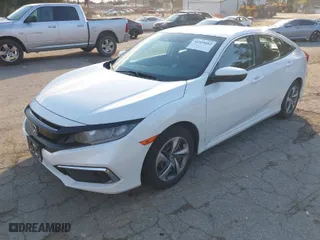 2019 Honda Civic Sedan LX with VIN 2HGFC2F67KH506515, listed as a IAAI auction lot 41755585 with 87,528 mi miles. Bid and sale history available at carsss.com. Image 2.