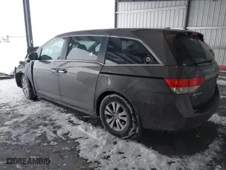 2016 Honda Odyssey SE with VIN 5FNRL5H32GB155946, listed as a IAAI auction lot 41590237 with 140,167 mi miles. Bid and sale history available at carsss.com. Image 3.