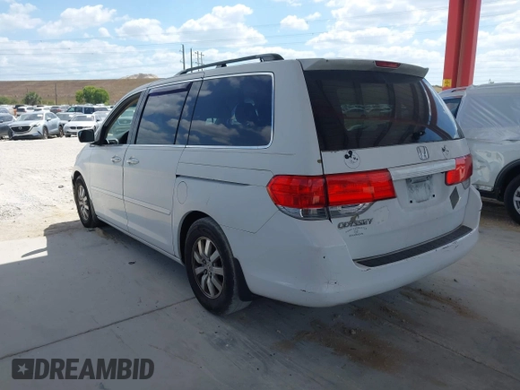 2009 Honda Odyssey EX-L with VIN 5FNRL386X9B056552, listed as a IAAI auction lot 42126144 with 194,722 mi miles. Bid and sale history available at carsss.com. Image 3.
