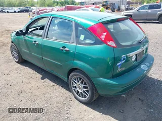 2002 Ford Focus ZX5 z VIN 3FAFP373X2R130965, wystawiony jako IAAI lot #42216638 z przebiegiem 59 236 mil mil oraz . Historia ofert i sprzedaży dostępna na DreamBid. Obrazek 3.