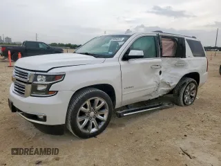 2016 Chevrolet Tahoe LTZ with VIN 1GNSKCKC5GR166460, listed as a Copart auction lot 59393975 with 120,015 mi miles and Salvage title. Bid and sale history available at DreamBid. Image 1.