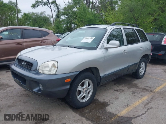 2002 Hyundai Santa Fe GLS with VIN KM8SC73D42U152166, listed as a IAAI auction lot 42088109 with 199,051 mi miles. Bid and sale history available at carsss.com. Image 2.