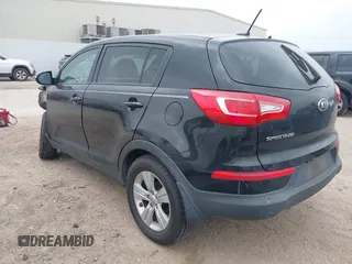 2013 Kia Sportage LX with VIN KNDPB3A20D7506063, listed as a IAAI auction lot 41796823 with 148,841 mi miles. Bid and sale history available at carsss.com. Image 3.