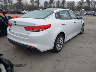 2016 Kia Optima EX with VIN 5XXGU4L30GG086743, listed as a IAAI auction lot 41275516 with 118,699 mi miles. Bid and sale history available at carsss.com. Image 4.