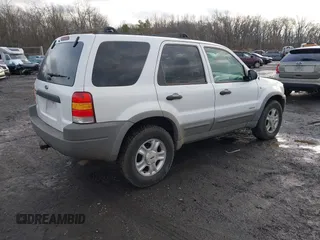 2002 Ford Escape XLT Choice with VIN 1FMYU04142KD82594, listed as a IAAI auction lot 41574646 with 173,174 mi miles. Bid and sale history available at carsss.com. Image 4.