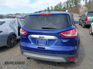 2016 Ford Escape Titanium with VIN 1FMCU9JXXGUA71898, listed as a IAAI auction lot 41758284 with 51,935 mi miles. Bid and sale history available at carsss.com. Image 16.
