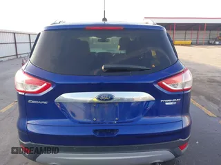 2014 Ford Escape Titanium with VIN 1FMCU9JX4EUD30964, listed as a IAAI auction lot 41772153 with 179,481 mi miles and . Bid and sale history available at DreamBid. Image 16.