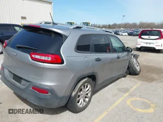 2015 Jeep Cherokee Sport with VIN 1C4PJLAB2FW696010, listed as a IAAI auction lot 42032956 with 88,323 mi miles. Bid and sale history available at carsss.com. Image 4.