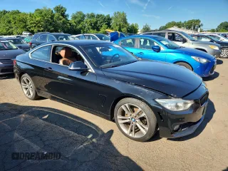 2016 BMW 4 Series 428i xDrive with VIN WBA3N9C52GK249387, listed as a Copart auction lot 65697805 with 203,385 mi miles and Clean title. Bid and sale history available at DreamBid. Image 4.