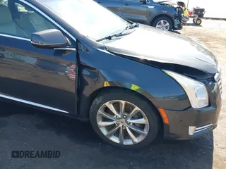2014 Cadillac XTS Luxury z VIN 2G61M5S37E9211547, wystawiony jako IAAI lot #42373128 z przebiegiem 146 354 mil mil oraz . Historia ofert i sprzedaży dostępna na DreamBid. Obrazek 6.