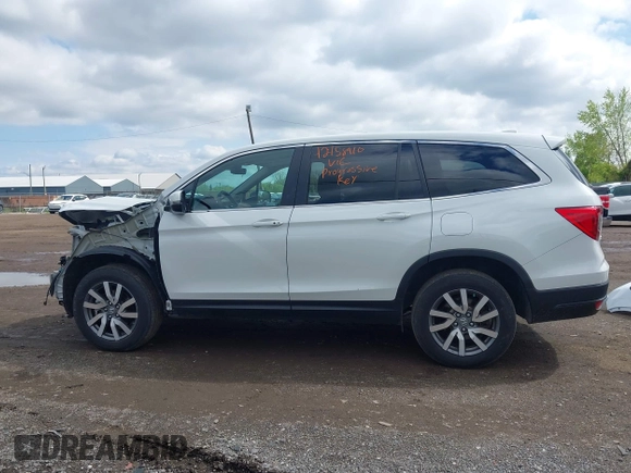 2021 Honda Pilot EX-L with VIN 5FNYF6H57MB054147, listed as a IAAI auction lot 42158910 with 37,811 mi miles and . Bid and sale history available at DreamBid. Image 15.