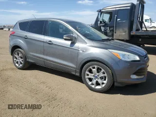2013 Ford Escape SEL with VIN 1FMCU9H9XDUA25362, listed as a Copart auction lot 52441465 with 167,594 mi miles and Salvage Title. Bid and sale history available at carsss.com. Image 4.