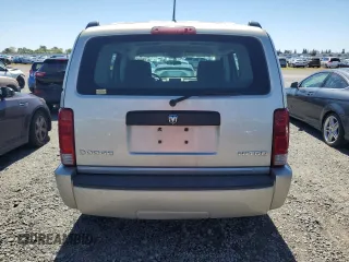 2009 Dodge Nitro SE z VIN 1D8GT28K19W541402, wystawiony jako Copart lot #57487874 z przebiegiem 189 653 mil mil oraz Szkoda całkowita • Salvage title. Historia ofert i sprzedaży dostępna na DreamBid. Obrazek 6.