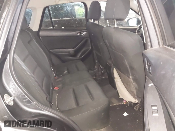 2015 Mazda CX-5 Touring with VIN JM3KE2CY2F0458114, listed as a IAAI auction lot 41545493 with 138,061 mi miles. Bid and sale history available at carsss.com. Image 8.