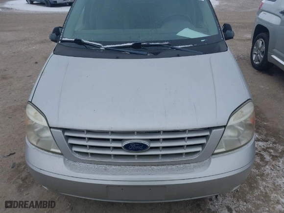 2004 Ford Freestar Wagon S with VIN 2FMZA50614BA19517, listed as a IAAI auction lot 41264090 with NaN miles. Bid and sale history available at carsss.com. Image 6.