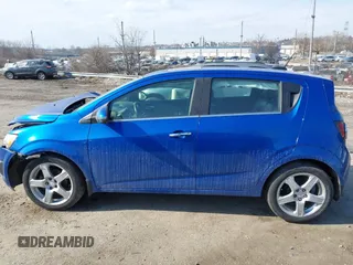 2016 Chevrolet Sonic LTZ z VIN 1G1JE6SB5G4150771, wystawiony jako IAAI lot #41662866 z przebiegiem 101 476 mil mil oraz . Historia ofert i sprzedaży dostępna na DreamBid. Obrazek 14.