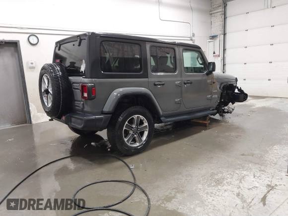 2019 Jeep Wrangler Unlimited Sahara with VIN 1C4HJXEG9KW656454, listed as a IAAI auction lot 41648236 with 75,403 mi miles and . Bid and sale history available at DreamBid. Image 4.