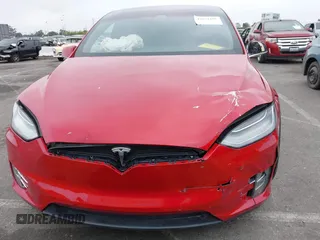 2021 Tesla Model X Long Range Plus with VIN 5YJXCBE24MF324376, listed as a IAAI auction lot 42034108 with Not Provided miles and . Bid and sale history available at carsss.com. Image 12.