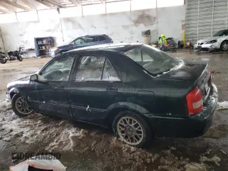 1999 Mazda Protege DX z VIN JM1BJ2220X0108600, wystawiony jako Copart lot #77004894 z przebiegiem 220 836 mil mil oraz Szkoda całkowita • Salvage title. Historia ofert i sprzedaży dostępna na DreamBid. Obrazek 2.