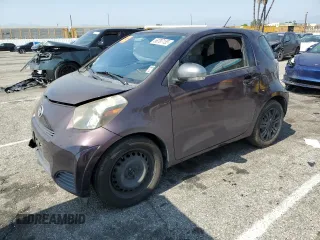 2013 Scion iQ with VIN JTNJJXB05DJ022305, listed as a Copart auction lot 58787155 with 136,046 mi miles and Salvage title. Bid and sale history available at DreamBid. Image 1.