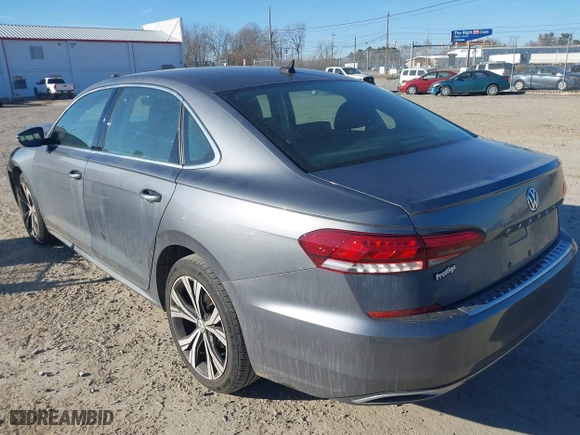 2021 Volkswagen Passat 2.0T SE with VIN 1VWSA7A30MC016434, listed as a IAAI auction lot 41418589 with 64,001 mi miles. Bid and sale history available at carsss.com. Image 3.