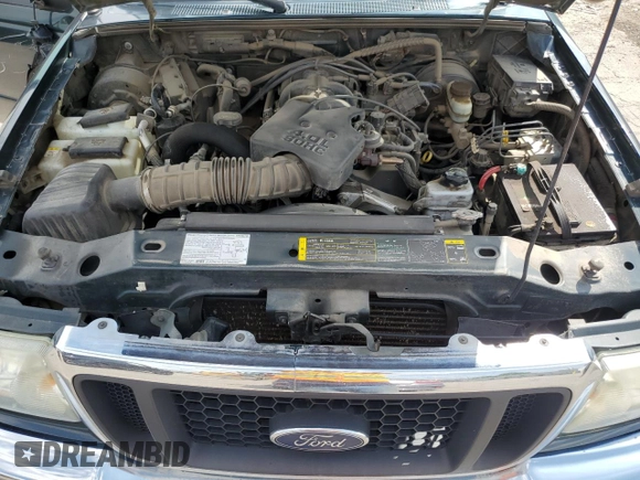 2004 Ford Ranger XL Fleet with VIN 1FTZR15E84PA70642, listed as a Copart auction lot 61016695 with 122,463 mi miles and Salvage title. Bid and sale history available at DreamBid. Image 11.
