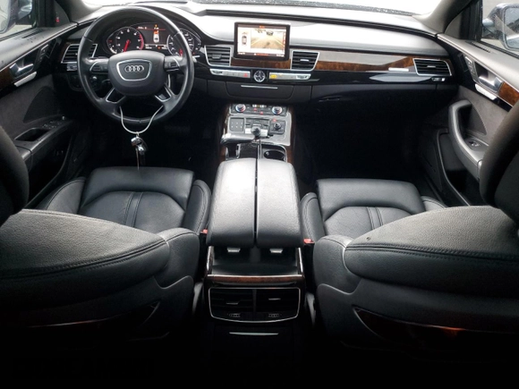 2016 Audi A8 3.0T с VIN WAU34AFD2GN001811, выставлен на аукционе Copart как лот 62304935 с пробегом 76 161 миль миль и Списание • Salvage title. История ставок и продаж доступна на DreamBid. Изображение 8.