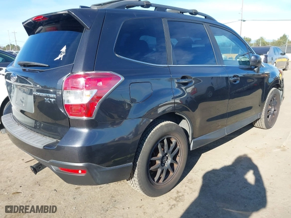 2016 Subaru Forester 2.0XT Premium with VIN JF2SJGDC5GH565148, listed as a IAAI auction lot 41226042 with 107,841 mi miles. Bid and sale history available at carsss.com. Image 4.