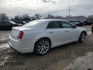 2015 Chrysler 300 C with VIN 2C3CCAET3FH922283, listed as a Copart auction lot 43240615 with 46,329 mi miles and Salvage Title. Bid and sale history available at DreamBid. Image 3.