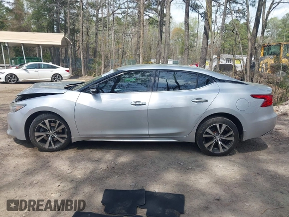 2016 Nissan Maxima SL with VIN 1N4AA6AP9GC406406, listed as a IAAI auction lot 41954790 with 139,380 mi miles and . Bid and sale history available at DreamBid. Image 14.