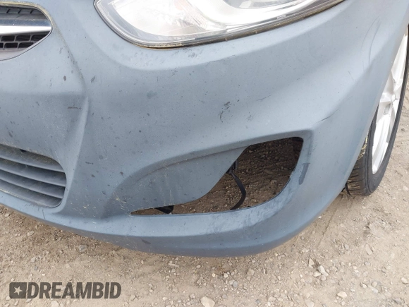 2013 Hyundai Accent GLS z VIN KMHCU4AE3DU580650, wystawiony jako IAAI lot #42479723 z przebiegiem 94 416 mil mil oraz . Historia ofert i sprzedaży dostępna na DreamBid. Obrazek 13.
