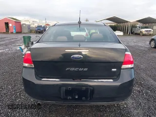 2010 Ford Focus SE with VIN 1FAHP3FN1AW108974, listed as a IAAI auction lot 41208950 with 146,536 mi miles. Bid and sale history available at carsss.com. Image 16.