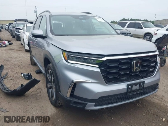 2023 Honda Pilot Touring with VIN 5FNYG2H75PB014662, listed as a IAAI auction lot 41889246 with 14,413 mi miles. Bid and sale history available at carsss.com. Image 1.