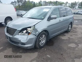 2007 Honda Odyssey EX with VIN 5FNRL38487B018720, listed as a IAAI auction lot 42041940 with 388,509 mi miles and . Bid and sale history available at DreamBid. Image 2.
