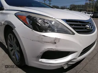2014 Hyundai Azera with VIN KMHFG4JG8EA346609, listed as a IAAI auction lot 42010249 with 105,646 mi miles and . Bid and sale history available at DreamBid. Image 6.