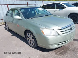 2007 Toyota Avalon XL with VIN 4T1BK36B07U239298, listed as a IAAI auction lot 42046413 with 221,018 mi miles. Bid and sale history available at carsss.com. Image 1.