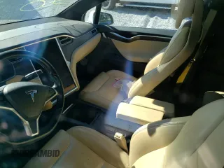 2016 Tesla Model X 70D with VIN 5YJXCAE29GF004033, listed as a Copart auction lot 49673975 with 220,259 mi miles and Salvage Title. Bid and sale history available at DreamBid. Image 8.