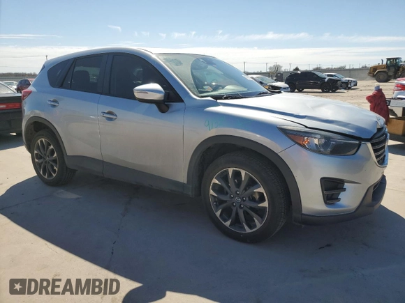 2016 Mazda CX-5 Grand Touring with VIN JM3KE2DYXG0717982, listed as a Copart auction lot 47405735 with 182,556 mi miles and Salvage Title. Bid and sale history available at carsss.com. Image 4.
