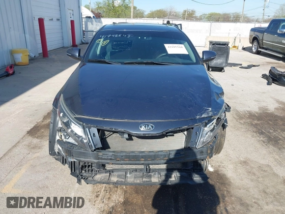 2015 Kia Optima LX with VIN 5XXGM4A77FG381505, listed as a IAAI auction lot 42105568 with 164,641 mi miles and . Bid and sale history available at DreamBid. Image 13.