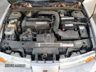2001 Saturn SL z VIN 1G8ZK52761Z204012, wystawiony jako Copart lot #86618384 z przebiegiem 99 674 mil mil oraz Szkoda całkowita • Salvage title. Historia ofert i sprzedaży dostępna na DreamBid. Obrazek 11.